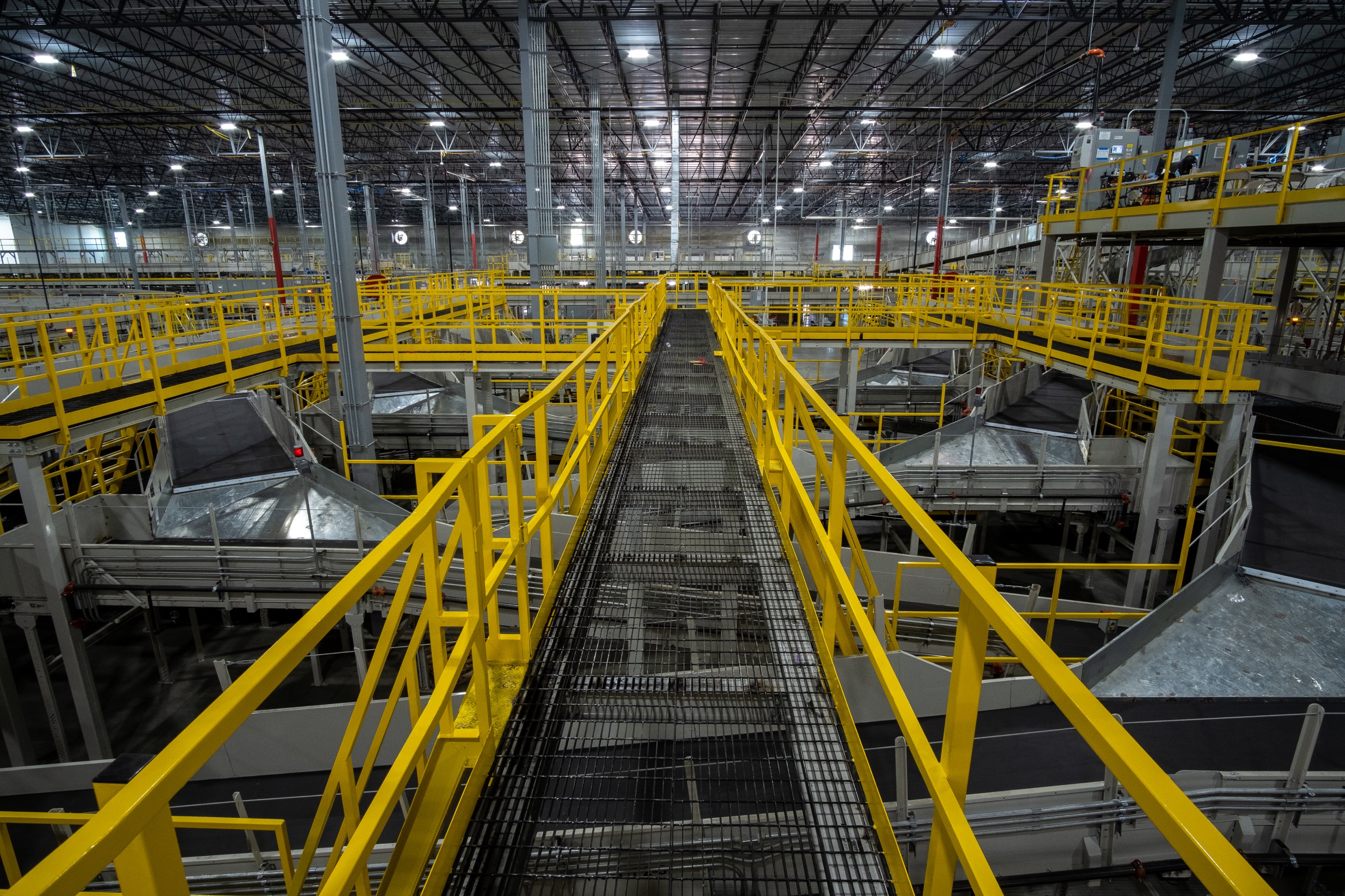 Steel framing and catwalks inside a large warehouse structure