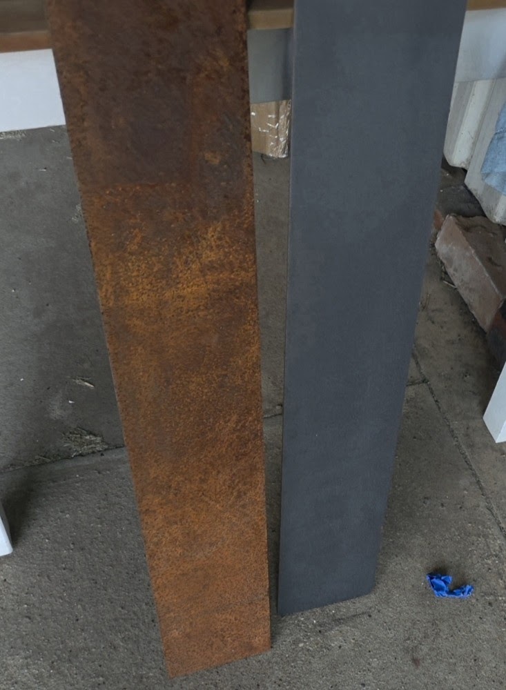 Real Nova Laser Technologies corrosion removal — corroded steel on the left, laser-cleaned bare metal on the right